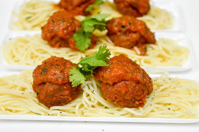 Close-up of noodles with meatballs