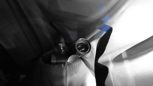 Close-up of hand holding glass