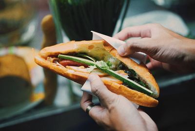 Close-up of person holding hands