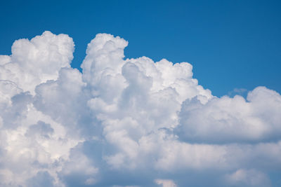 White cumulus beautiful clouds float in the blue sky. beautiful view of the cloudy sky.