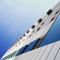 Low angle view of modern building against sky