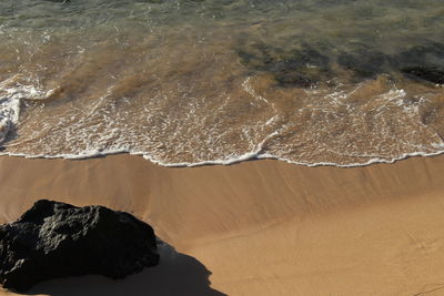 High angle view of sand dune on beach