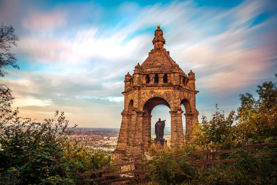 Low angle view of monument against sky