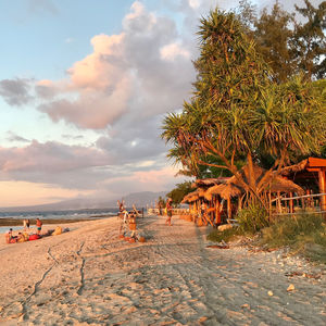 Scenic view of beach against sky during sunset