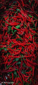 Full frame shot of red chili peppers for sale