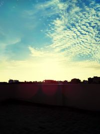 Scenic view of silhouette landscape against sky during sunset