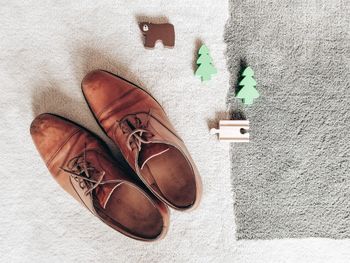 High angle view of shoes on rug