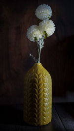 Close-up of white flower vase on table