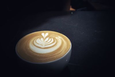 Close-up of cappuccino on table