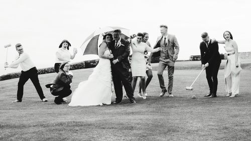 Group of people playing on field