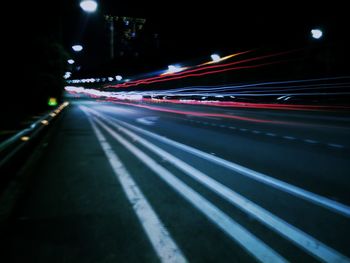 Light trails on road at night