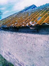 Low angle view of old building against sky