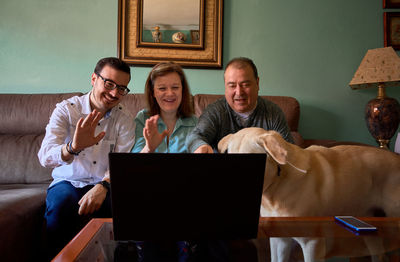 Family talks online in their living room