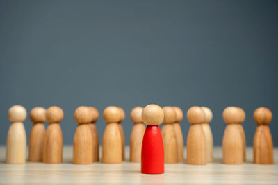 Close-up of chess pieces against gray background