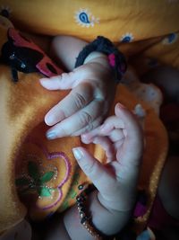 High angle view of woman holding hands