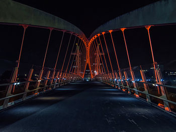 View of suspension bridge at night