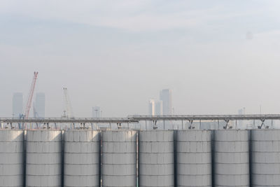 View of factory against sky