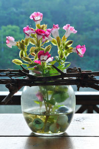 Close-up of flower vase on table