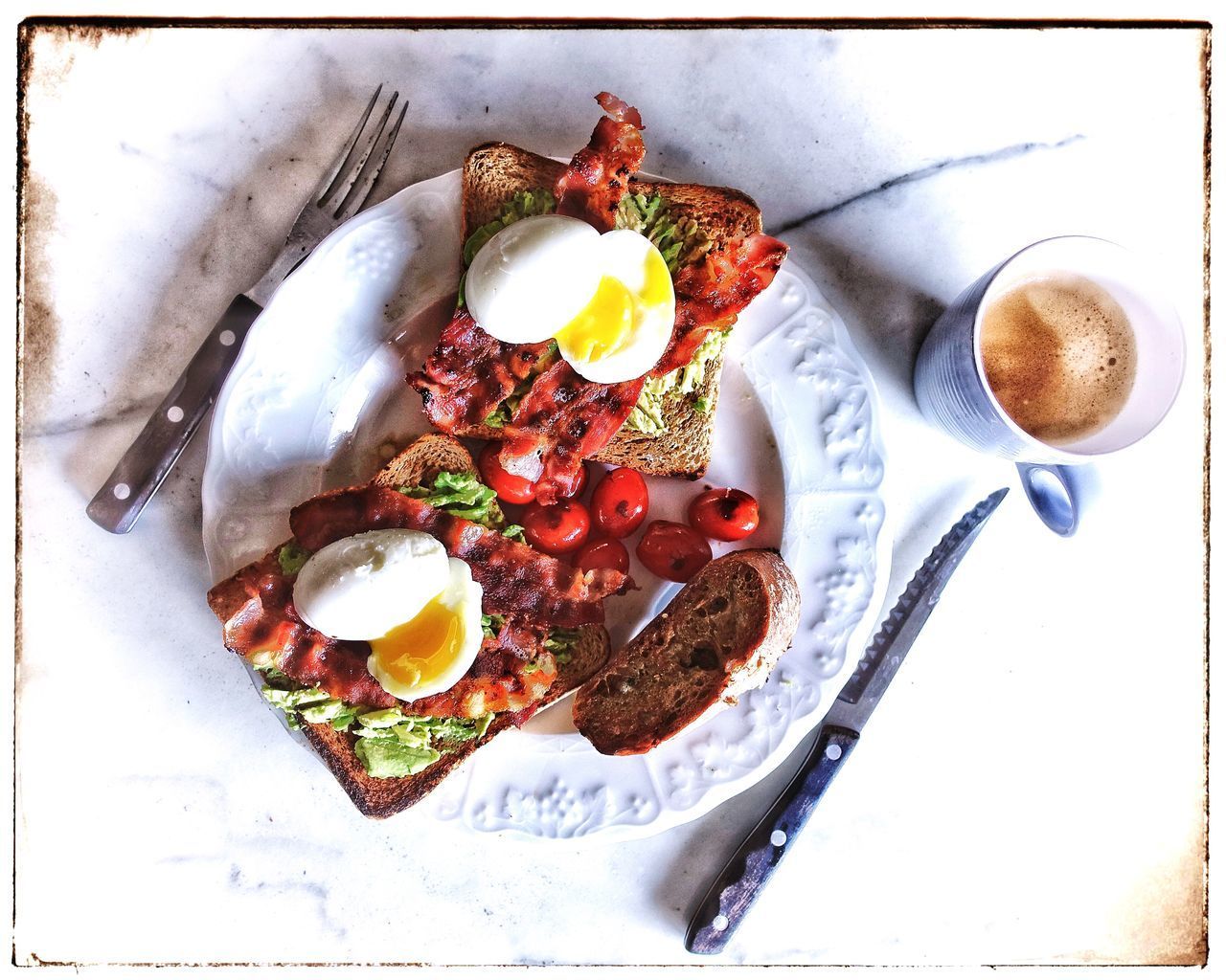 HIGH ANGLE VIEW OF BREAKFAST IN PLATE ON TABLE