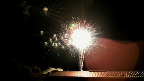 Low angle view of firework display