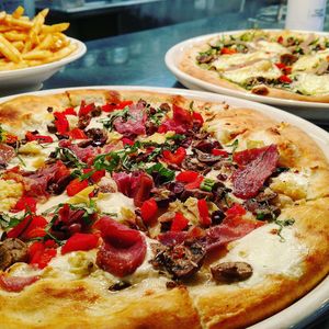 Close-up of pizza served in plate