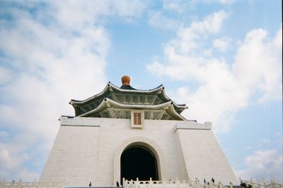 Low angle view of temple building against sky