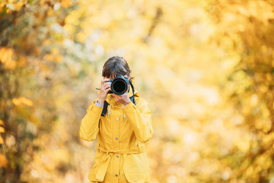 Man photographing with camera