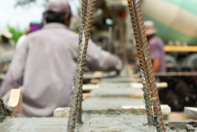 Rear view of man on rope