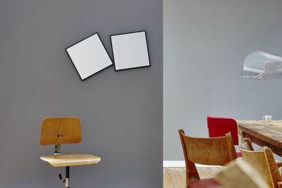 Empty chairs and table against wall at home