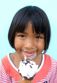 Close-up of girl eating ice cream