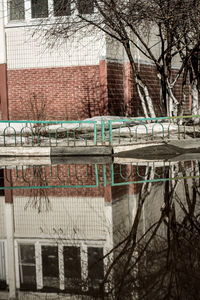 Reflection of building on water in canal