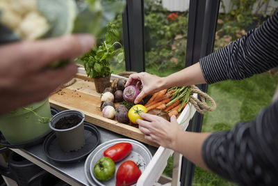 Midsection of man preparing food