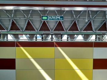 View of yellow illuminated railroad station platform