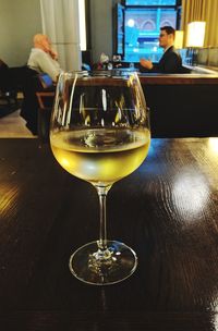 Glass of wine on table in restaurant