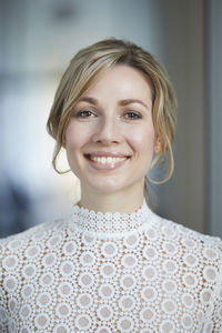 Portrait of blond bride, smiling