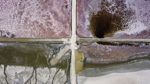 High angle view of water flowing through glass