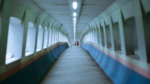 Illuminated corridor of covered bridge 