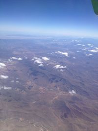 Aerial view of dramatic landscape against sky