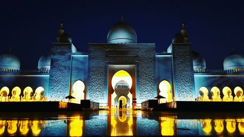 Illuminated mosque at night