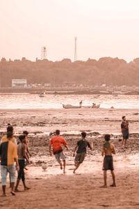 People walking on beach