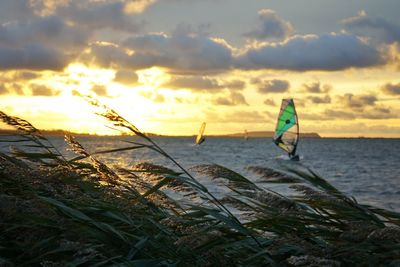 Scenic view of sea against sky at sunset