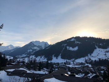 Scenic view of mountains against sky during winter