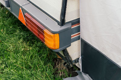 Rear lights of a caravan and part of the awning