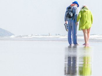 Woman standing on beach