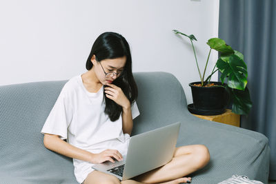 Young woman using mobile phone