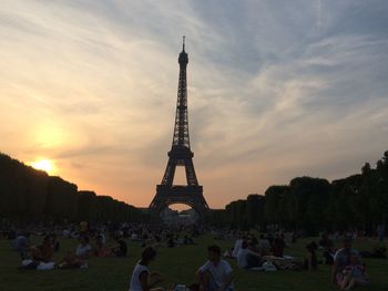 Silhouette of eiffel tower against sky