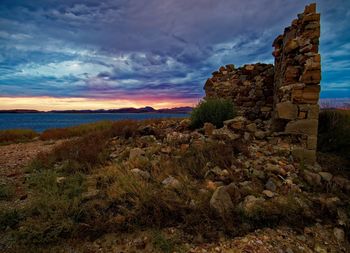 Scenic view of landscape against sky during sunset