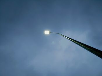 Low angle view of street light against sky