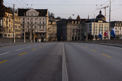 Surface level of road against buildings in city