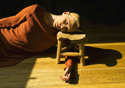 Low section of woman sitting on hammock